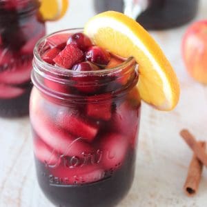 Cranberries and apples give this delicious sangria recipe tons of great fall flavors, mix up a pitcher to celebrate the holidays with friends and family!