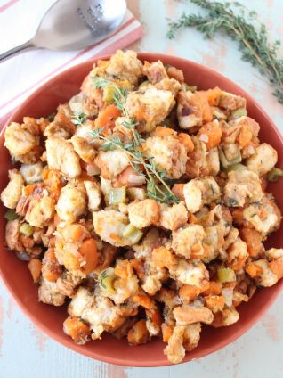 Let this delicious sweet potato stuffing recipe slow cook while preparing your Thanksgiving meal, leaving extra space in the oven & saving you time!