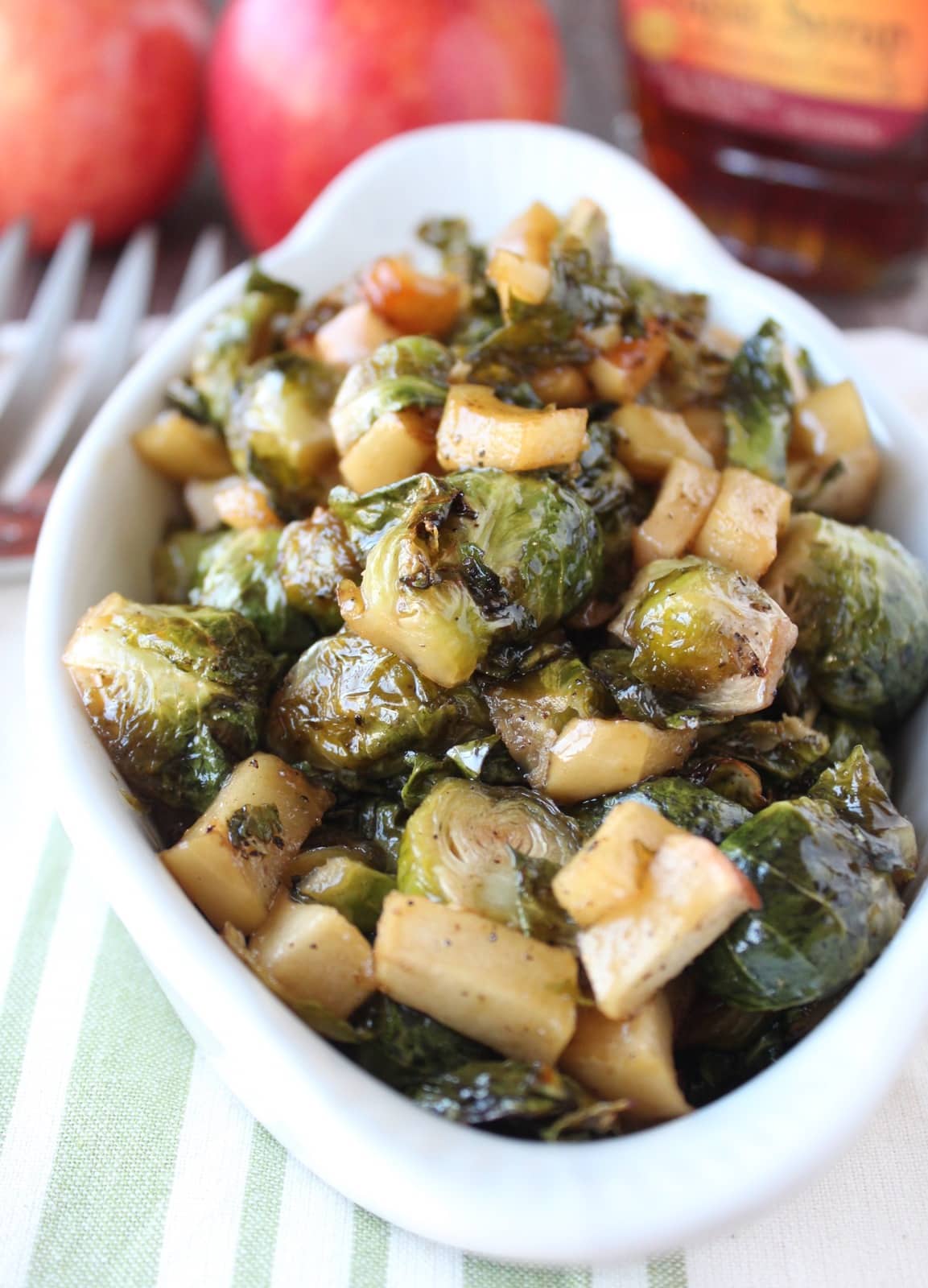 roasted brussels sprouts and diced apples in serving dish