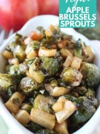 roasted brussels sprouts and apples in white serving dish