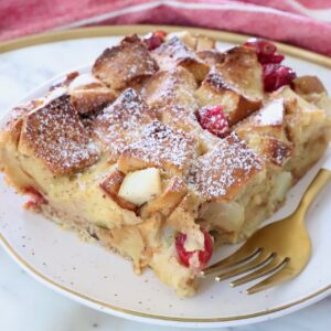 piece of french toast casserole on a plate with a fork