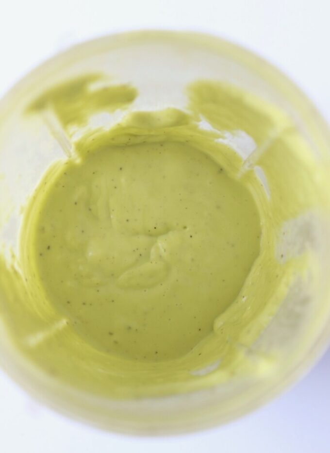 avocado vinaigrette dressing in a blender cup