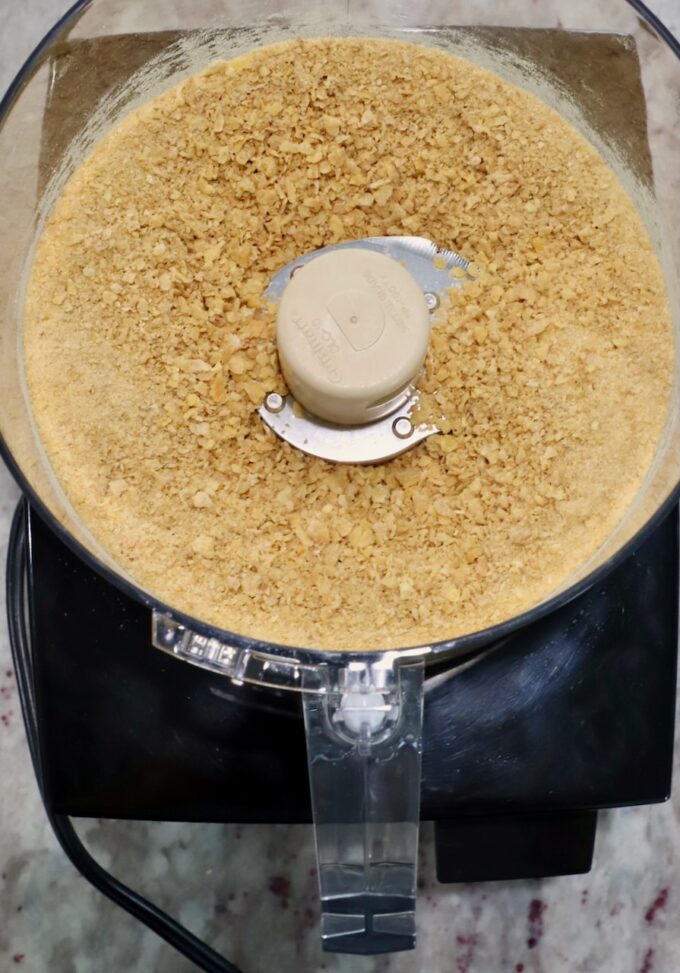 crushed corn flakes cereal in a food processor