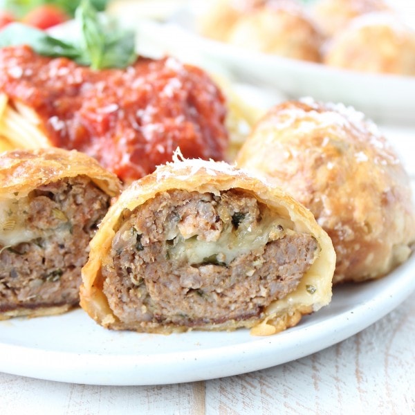 meatball wellington cut in half on plate