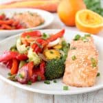 An easy Chinese orange sauce is prepared & brushed over Orange Glazed Salmon and colorful vegetables in this healthy, simple, 30 minute foil dinner recipe!