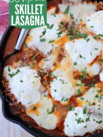 prepared lasagna in skillet with serving spoon