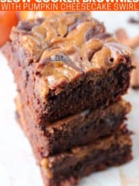 Pumpkin swirled brownies stacked up on top of each other