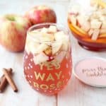 Fall flavors are combined with sparkling rosé in this delicious Honey Apple Sangria Recipe, perfect for holiday parties or a fun girls night in!