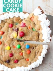 candy cookie cake with slice lifted out of the cake