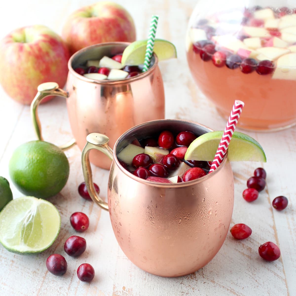 https://whitneybond.com/wp-content/uploads/2016/11/Cranberry-Apple-Moscow-Mule-Punch-11.jpg