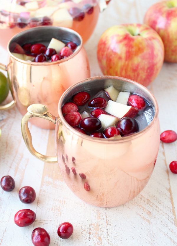 This recipe for Cranberry Apple Moscow Mule Punch is perfect for holiday parties, Friendsgiving, or anytime you need a Moscow Mule recipe for a crowd!