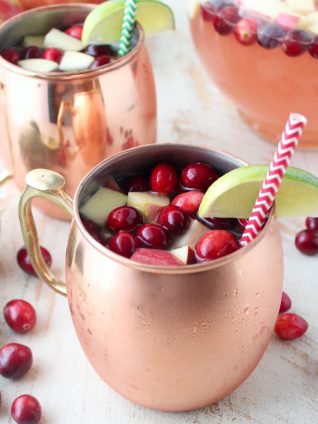 This recipe for Cranberry Apple Moscow Mule Punch is perfect for holiday parties, Friendsgiving, or anytime you need a Moscow Mule recipe for a crowd!