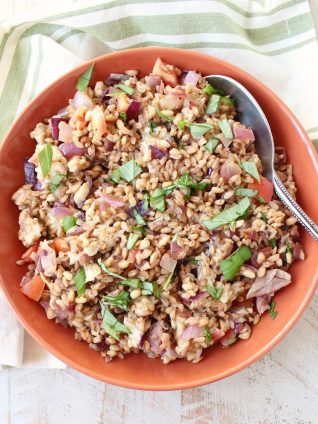 This farro recipe combines the nutty Italian grain with prosciutto, pine nuts and provolone for an easy and delicious main or side dish.