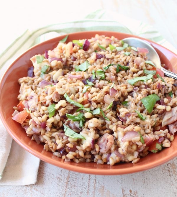 This farro recipe combines the nutty Italian grain with prosciutto, pine nuts and provolone for an easy and delicious main or side dish.