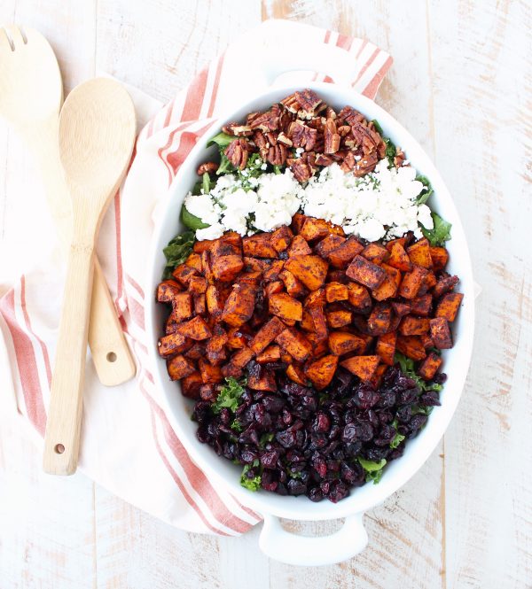 This Chili Roasted Sweet Potato & Cranberry Salad recipe combines sweet, savory & tart ingredients to make the most flavorful vegetarian salad ever!