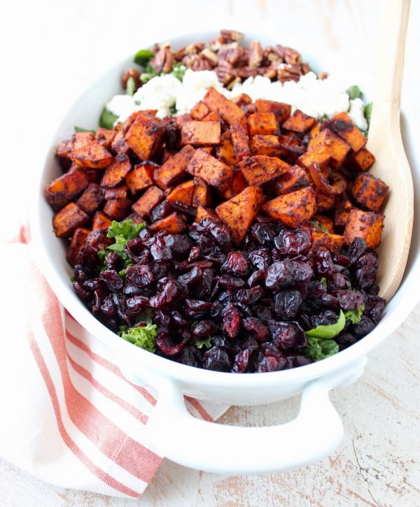 This Chili Roasted Sweet Potato & Cranberry Salad recipe combines sweet, savory & tart ingredients to make the most flavorful vegetarian salad ever!
