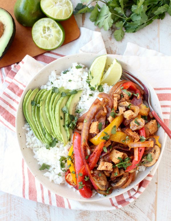 This turkey fajita rice bowl recipe is easy to make & the perfect use for leftover turkey at Thanksgiving, but makes a delicious meal anytime of the year!