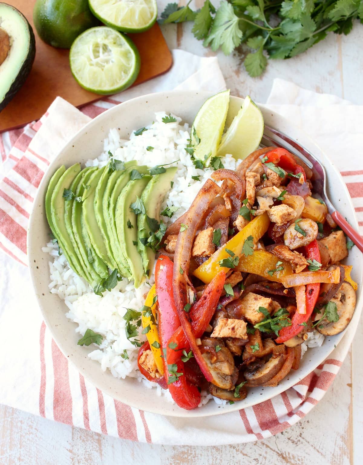 This turkey fajita rice bowl recipe is easy to make & the perfect use for leftover turkey at Thanksgiving, but makes a delicious meal anytime of the year!