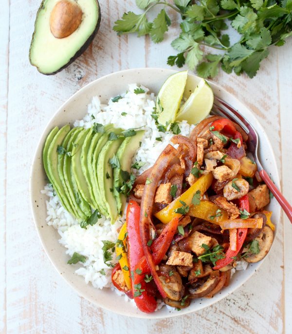 This turkey fajita rice bowl recipe is easy to make & the perfect use for leftover turkey at Thanksgiving, but makes a delicious meal anytime of the year!