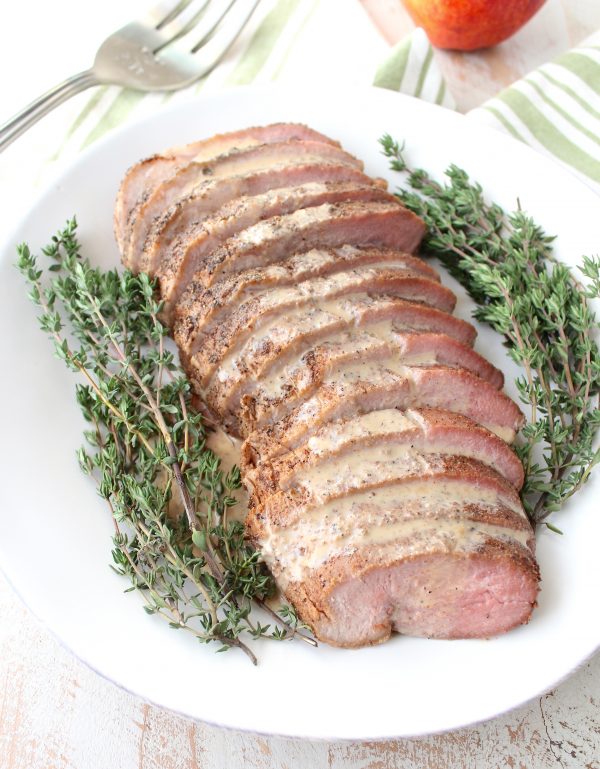A boneless pork loin is cooked in a delicious combination of chipotle, nutmeg, cloves, maple syrup & apple juice in a sous vide or slow cooker.