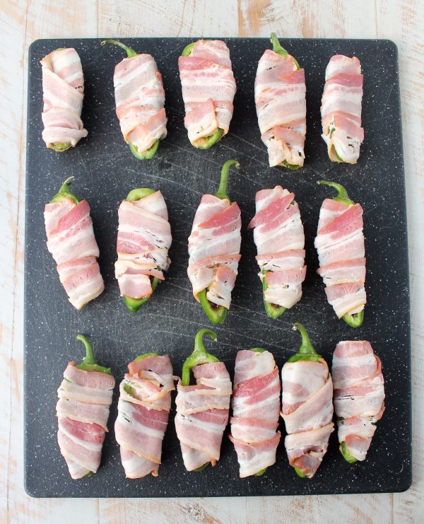 Bacon jam and triple creme cheese fill fresh jalapenos in this delicious and easy jalapeno poppers recipe, perfect for a dinner or party appetizer!