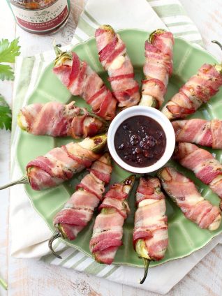 Bacon jam and triple creme cheese fill fresh jalapenos in this delicious and easy jalapeno poppers recipe, perfect for a dinner or party appetizer!