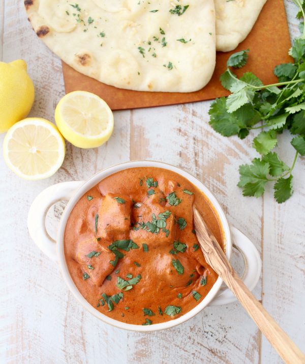 This 30 Minute Indian Butter Chicken recipe is a quick & easy twist on a classic Indian dish that's perfect served with cilantro rice & garlic naan!