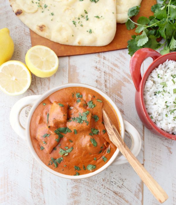 This 30 Minute Indian Butter Chicken recipe is a quick & easy twist on a classic Indian dish that's perfect served with cilantro rice & garlic naan!