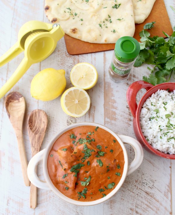 This 30 Minute Indian Butter Chicken recipe is a quick & easy twist on a classic Indian dish that's perfect served with cilantro rice & garlic naan!