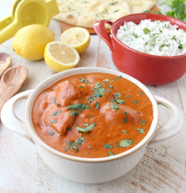 This 30 Minute Indian Butter Chicken recipe is a quick & easy twist on a classic Indian dish that's perfect served with cilantro rice & garlic naan!