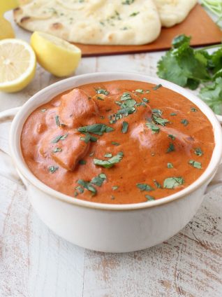 This 30 Minute Indian Butter Chicken recipe is a quick & easy twist on a classic Indian dish that's perfect served with cilantro rice & garlic naan!