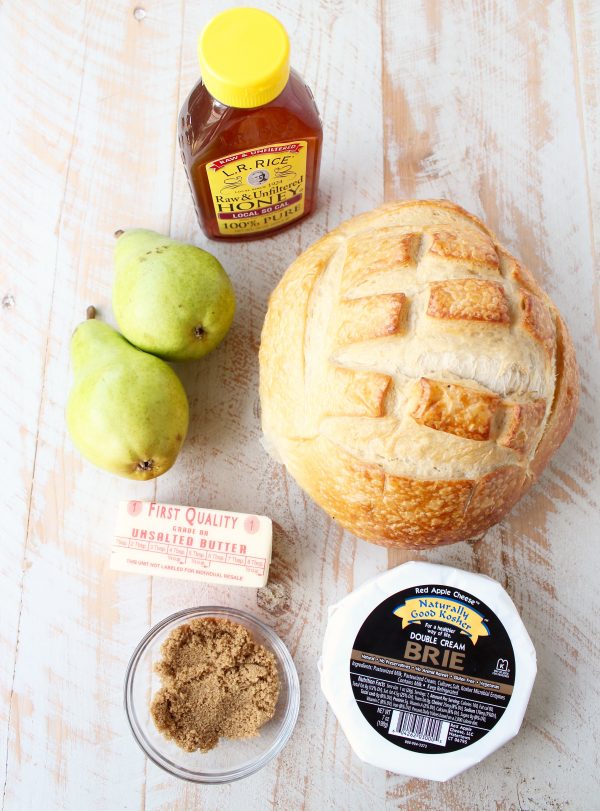 Baked brie sourdough bread bowl ingredients, honey, pears, butter, brie, sourdough and brown sugar