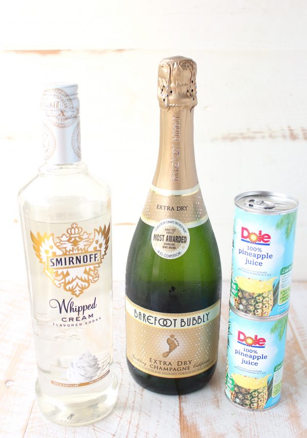 Disney's famous Pineapple Whip is turned into a delicious fizz cocktail in this simple 3-ingredient drink recipe, perfect for any special occasion!