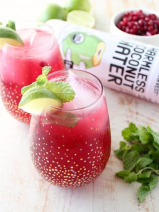 Sparkling pomegranate soda & coconut water are added to this mojito punch recipe, perfect for celebrating everything from holiday parties to Summer BBQ's!