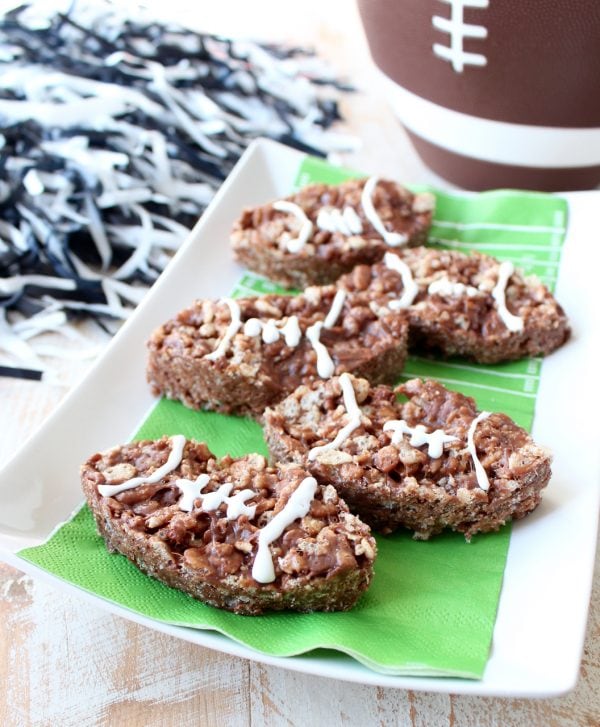 Nutella Rice Krispie Treats are a deliciously easy dessert, make them football shaped for game day parties or Superbowl Sunday!