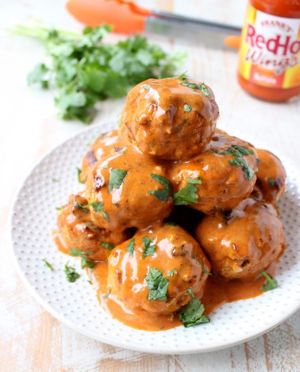 These Honey Mustard Buffalo Meatballs are sweet, hot & tangy! They're perfect as a game day or party appetizer, or served on rolls as meatball subs!