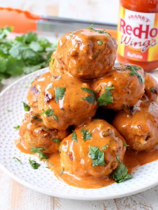 These Honey Mustard Buffalo Meatballs are sweet, hot & tangy! They're perfect as a game day or party appetizer, or served on rolls as meatball subs!