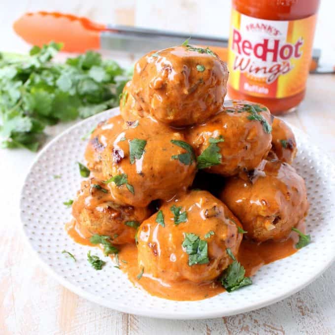 These Honey Mustard Buffalo Meatballs are sweet, hot & tangy! They're perfect as a game day or party appetizer, or served on rolls as meatball subs!