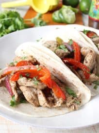 Give your chicken fajitas a taste of the Caribbean with this tasty recipe for Jerk Chicken Fajitas, made in only 20 minutes for an easy weeknight dinner!