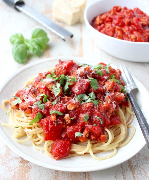 Roasted red peppers add a delicious flavor to this healthy Turkey Bolognese recipe, serve over spaghetti or with zucchini noodles for a gluten free meal.