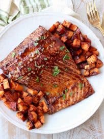 Baked Cinnamon Chipotle Salmon is a healthy, gluten free recipe that has the perfect balance of sweet and spicy, and is made in only 29 minutes for a quick and easy meal!