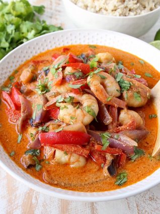 Shrimp & vegetables are cooked into a simple, delicious red curry sauce in this Red Curry Shrimp recipe, made in only 20 minutes for an easy weeknight meal!