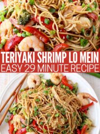 cooked shrimp tossed with noodles and vegetables on a plate with chopsticks