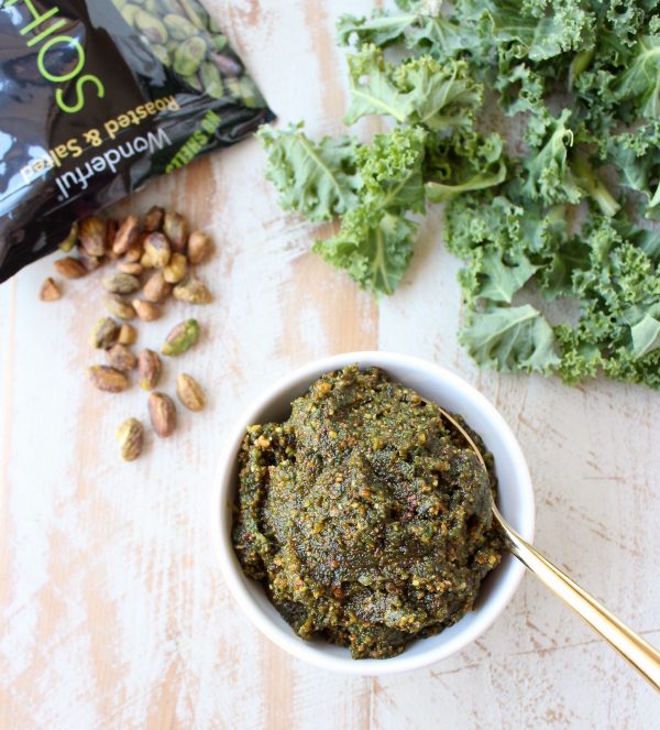 Fresh kale, pistachios and coconut oil are combined in this vegan, gluten free, healthy pistachio pesto recipe, perfect with pasta, chicken or on pizza!