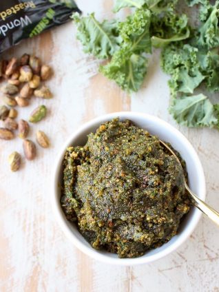 Fresh kale, pistachios and coconut oil are combined in this vegan, gluten free, healthy pistachio pesto recipe, perfect with pasta, chicken or on pizza!