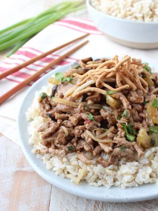 This easy Chinese Pork Chop Suey recipe combines pork, veggies & a delicious Asian sauce, served over white rice, topped with crispy chow mein noodles!