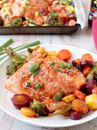 This Sheet Pan Salmon recipe with Thai Sweet Chili Sauce is easy to make in 29 minutes, it's gluten free, healthy & baked with veggies for a complete meal!