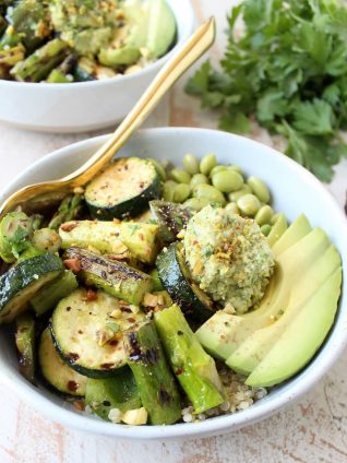 The Green Vegan Buddha Bowl is filled with grilled veggies, green tahini sauce, avocado & quinoa for a healthy, filling meal that's also gluten free!