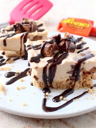 No bake cheesecake bars are a deliciously easy dessert, made with Reese's Peanut Butter Cups, they're filled with chocolate, peanut butter goodness!