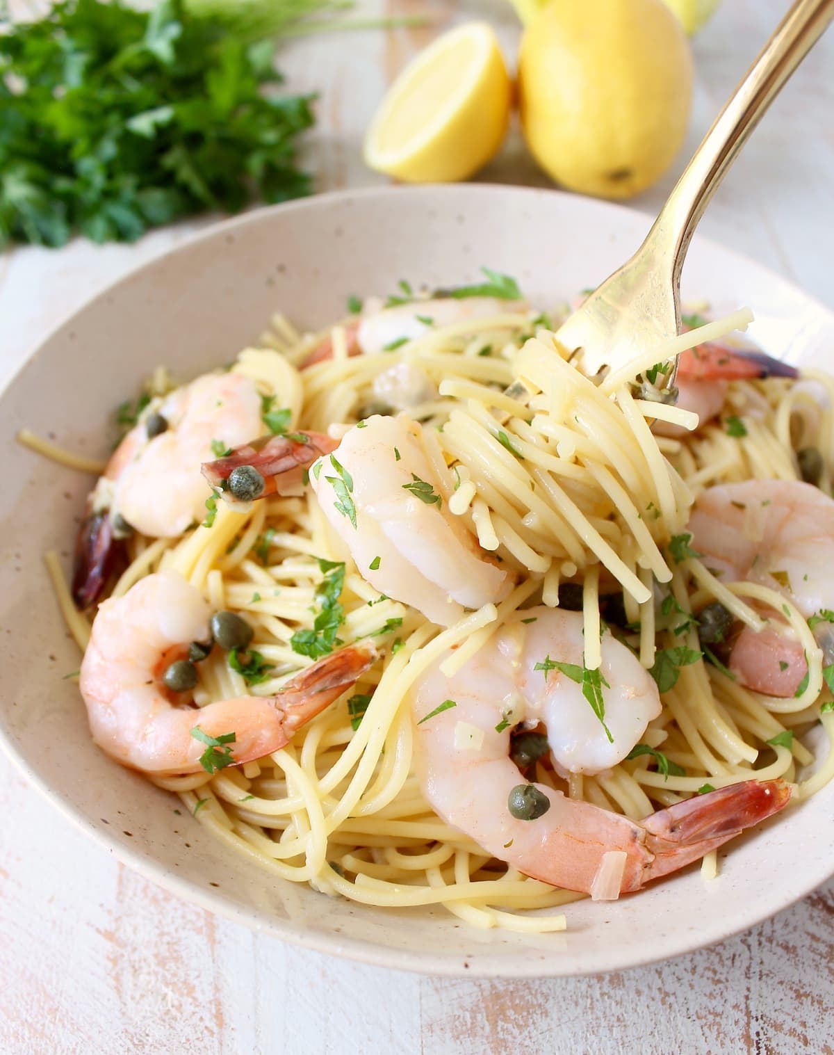 In just one pot and 20 minutes, whip up this delicious shrimp piccata pasta cooked in a scrumptious lemony, garlic, white wine sauce!